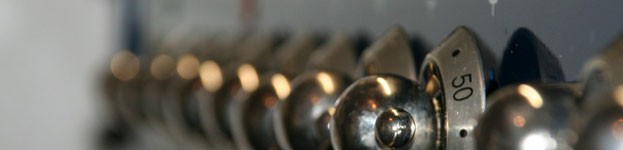 An image showing a close up of Oven Knobs