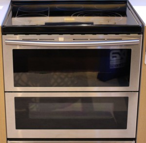 An image of a clean silver oven 