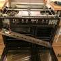 Dismantled cooker undergoing thorough repair