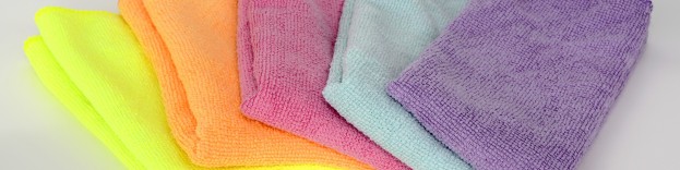 An image of five different coloured microfibre cloths used to clean stainless steel ovens