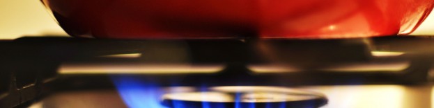 An image of a pan being heated up on a gas hob.