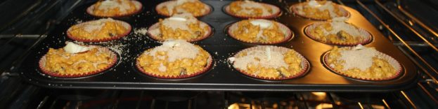 image of muffins baking in an oven